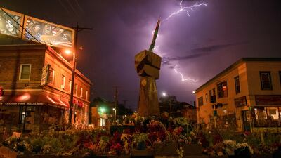 Lightning strikes above the George Floyd memorial in Minneapolis, Minnesota, on August 14, 2020 as racial justice protests continue across the country. Reuters