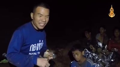 A video grab handout made available by Thai Royal Navy shows some of the members of the trapped football team. Royal Thai Navy / EPA