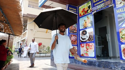 People have been urged to stay under the shade as temperatures soar. Chris Whiteoak / The National
