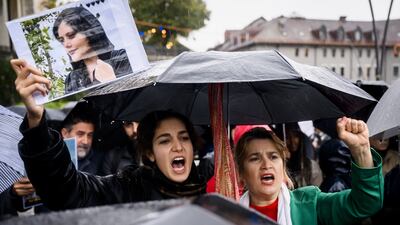 People take part in a protest in Lausanne, Switzerland. EPA