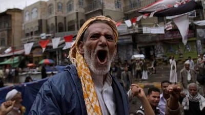 An elderly anti-government protester shouts slogans during a demonstration demanding the resignation of Yemeni president Ali Abdullah Saleh in Sana'a.