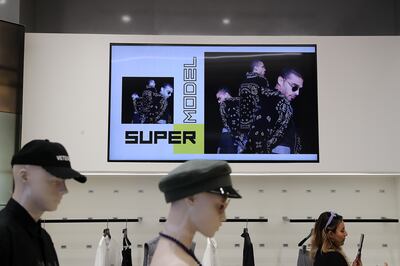 Screens in the store change according to products picked up by the customer. Pawan Singh / The National