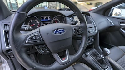 The steering wheel has everything you need within easy radius of your thumbs, from cruise control and limiter to fast-forwarding your music. Chris Whiteoak / The National