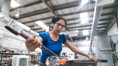 Anjali Srinivasan turns unwanted glassware into beautiful ornaments in her Dubai workshop ChoChoMa Studios. Reem Mohammed / The National