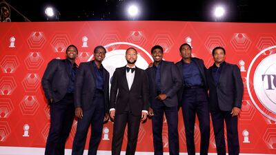 John Legend and the cast of 'Ain't Too Proud' pose on the red carpet. Reuters