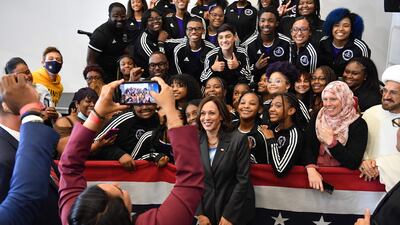 Kamala Harris poses with members of the Detroit Youth Choir after delivering remarks at a vaccine mobilisation event at the TCF Centre on July 12, 2021. AFP