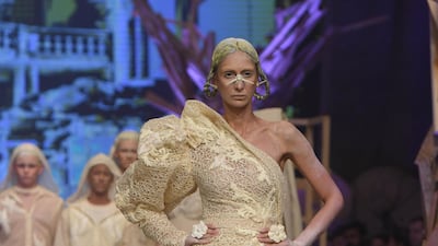 A model walks the runway at the Amato spring / summer 2020 show during Fashion Forward Dubai on November 02, 2019. Getty Images