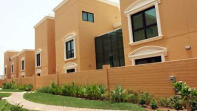 A new, three-storey villa is divided into about eight apartments.