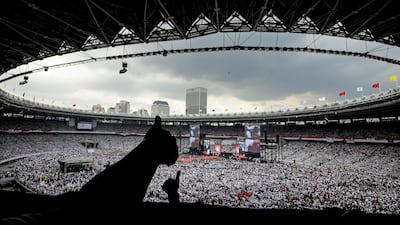Indonesian supporters give the thumbs up as a symbol of support as thousands of others attend the final campaign rally of incumbent president Joko Widodo at Bung Karno stadium in Jakarta, Indonesia, 13 April 2019. EPA