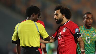 Mohamed Salah remonstrates to referee Jelly Chavani. Reuters