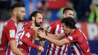 Atletico Madrid salvaged a point against Real Madrid thanks to a late equaliser from striker Luciano Vietto. Denis Doyle / Getty Images