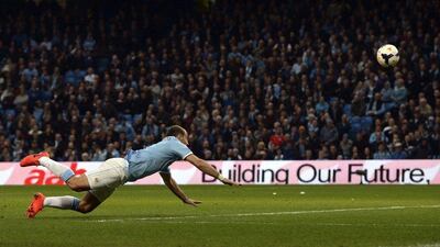 Manchester City defender Pablo Zabaleta scores on a header against West Bromwich Albion on Monday. Nigel Roddis / Reuters / April 21, 2014