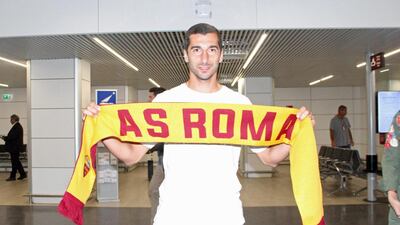 Henrikh Mkhitaryan arrived in Rome on Tuesday ahead of his loan switch to Roma. EPA