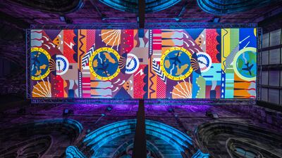 'Earth Calls', a colourful projection of images, was displayed in the roof space of Trinity Apse in Edinburgh on Wednesday. It is this year's Edinburgh's Hogmanay 'Message from the Skies'. Against the background of the recent Cop26 summit in Glasgow, it provides the poetic and artistic response of three Scottish writers to the climate emergency. PA