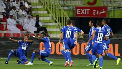 Ibrahima Toure, second left, celebrates with teammates after opening the scoring. Pawan Singh / The National