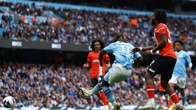 Manchester City's Jeremy Doku scores their fourth. Reuters
