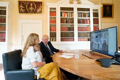UK Prime Minister Boris Johnson and his wife Carrie Johnson, pictured holding their son Wilfred, live in the 11 Downing Street flat. Picture by Andrew Parsons / No 10 Downing Street