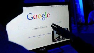 The number of online searches for the words "recession" and "economy" globally rose from a year ago via Google, which handles more than 1 billion queries a day. Emmanuel Dunand / AFP
