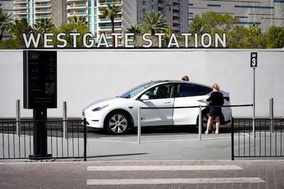 Vegas Loop riders jump in a vehicle at Westgate Las Vegas Resort & Casino (Joshua Longmore / The National)