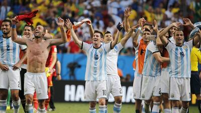 Lionel Messi and the rest of Argentina acknowledge the crowd after their win over Belgium in the 2014 World Cup quarter-finals on Saturday. Felipe Trueba / EPA / July 5, 2014