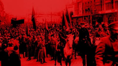 Bolshevik soldiers parade through the streets of Moscow. The Metropolitan Hotel can be seen at right. Corbis via Getty Images