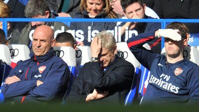 Arsene Wenger and Arsenal sit fourth in the Premier League, with 62 points from 30 matches, seven points off leaders Chelsea. Glyn Kirk / AFP / March 22, 2014