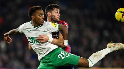 Newcastle midfielder Joe Willock and Palace defender Joel Ward battle for the ball. AFP