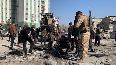 Afghan police arrive at the site of a bomb attack in Kabul on December 15, 2020. AP