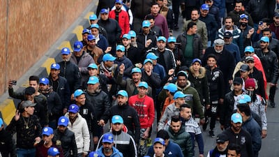 Supporters of Iraqi Shiite cleric Muqtada al-Sadr take part in a protest at the Al-Tahrir square in central Baghdad. EPA