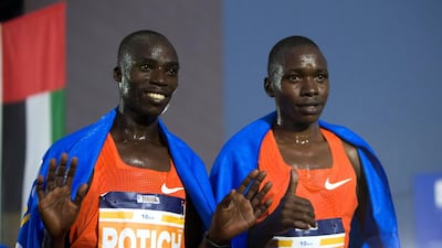 Winner of the 10km race Richard Kimunyan (right) and runner-up Maxwell Rotich at the Adnoc Abu Dhabi Marathon. Leslie Pableo for The National