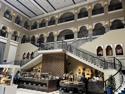 Breakfast is served, buffet-style, in Andalusia, the charming atrium courtyard with a grand staircase. Phil Johnson / The National