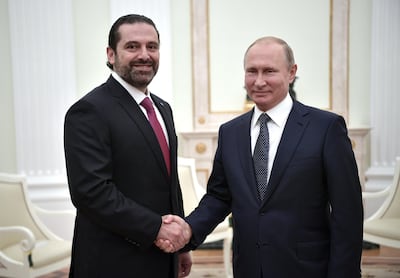 Russian President Vladimir Putin shakes hands with Lebanese Prime Minister Saad Haririat the Kremlin inJune 2018. EPA