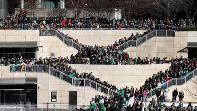 Spectators attend the dyeing of the Chicago River green for St. Patrick's Day celebration in Chicago. EPA