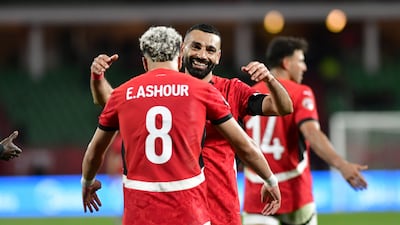 Egypt's Mohamed Salah celebrates with Emam Ashour after scoring during the Africa Cup of Nations round of 16 match against Benin. EPA