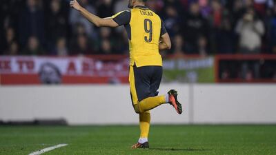 Lucas Perez of Arsenal celebrates after scoring his side’s second goal. Shaun Botterill / Getty Images