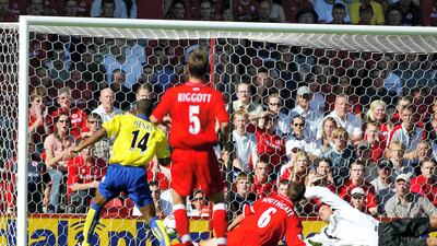Thierry Henry scores for Arsenal against Middlesbrough in 2003. AFP