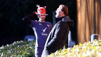 Jack Stephens wears his Christmas hat with manager Ralph Hasenhuttl. Getty