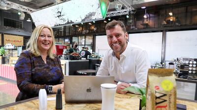 Helen Barrett, left, partner at CBD Corporate Services, and Chris Leighton, AirZones' co-founder, at the RAW Coffee Company in Al Quoz, in Dubai. Pawan Singh / The National