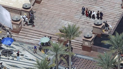 The main cast of Fast & Furious 7 filming at the Emirates Palace hotel in Abu Dhabi. Jeffrey E Biteng / The National