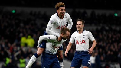 Christian Eriksen is mobbed after scoring Tottenham's second goal. EPA