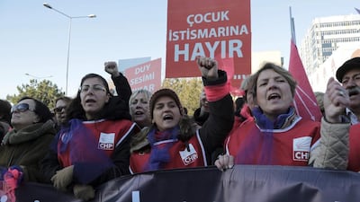 Thousands of members of Turkey's main opposition Republican People's Party march to the parliament in Ankara, Turkey on November 22, 2016. Following a public outcry, Turkey's government has withdrawn a proposal that critics said would have allowed men accused of sexually abusing underage girls to go free if they were married to their victims. The placard reads: 'No to exploitation of children'. Burhan Ozbilici/AP Photo