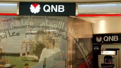 Qatar National Bank’s acquisition of Egypt’s National Société Générale Bank, pending regulatory approval, will mark the Qatari lender’s fourth major acquisition this year. Ryan Carter / The National