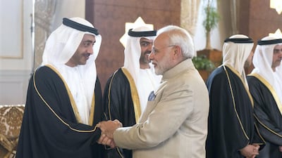 ABU DHABI, UNITED ARAB EMIRATES - February 10, 2018: HH Sheikh Abdullah bin Zayed Al Nahyan, UAE Minister of Foreign Affairs and International Cooperation (L), receives HE Narendra Modi Prime Minister of India (C), at the Presidential Airport. Seen with HH Lt General Sheikh Saif bin Zayed Al Nahyan, UAE Deputy Prime Minister and Minister of Interior (R), HH Sheikh Mansour bin Zayed Al Nahyan, UAE Deputy Prime Minister and Minister of Presidential Affairs (2nd R) and HH Sheikh Hamed bin Zayed Al Nahyan, Chairman of the Crown Prince Court of Abu Dhabi and Abu Dhabi Executive Council Member (3rd R). ( Rashed Al Mansoori / Crown Prince Court - Abu Dhabi ) ---