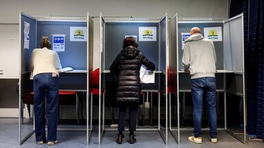 People vote during the Dutch parliamentary election in The Hague, Netherlands. Reuters