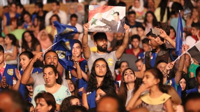 The four-day Bloudan Tourist Festival began near Damascus on Thursday with the slogan 'loyalty to the leader of the homeland and the Syrian Arab Army'. Youssef Badawi / EPA