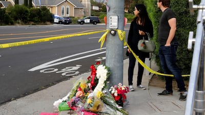 A makeshift memorial is placed by a light pole a block away from the shooting at the Congregation Chabad synagogue in Poway, San Diego, California, April 27, 2019. Reuters