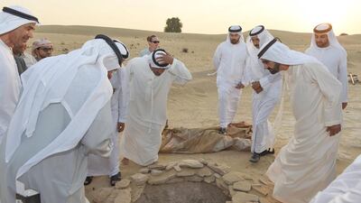 Sheikh Mohammed bin Rashid, Vice President and Ruler of Dubai, inspects the excavations at Saruq Al Hadid, which he sighted from a helicopter in 2002. Wam