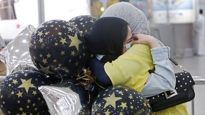 Warm welcome for a vaccinated expat at Kuwait's international airport. AFP