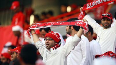 Al Ahli fans celebrate the first goal. Satish Kumar / The National
