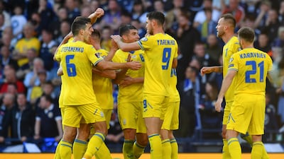 Andriy Yarmolenko celebrates with teammates. Getty
